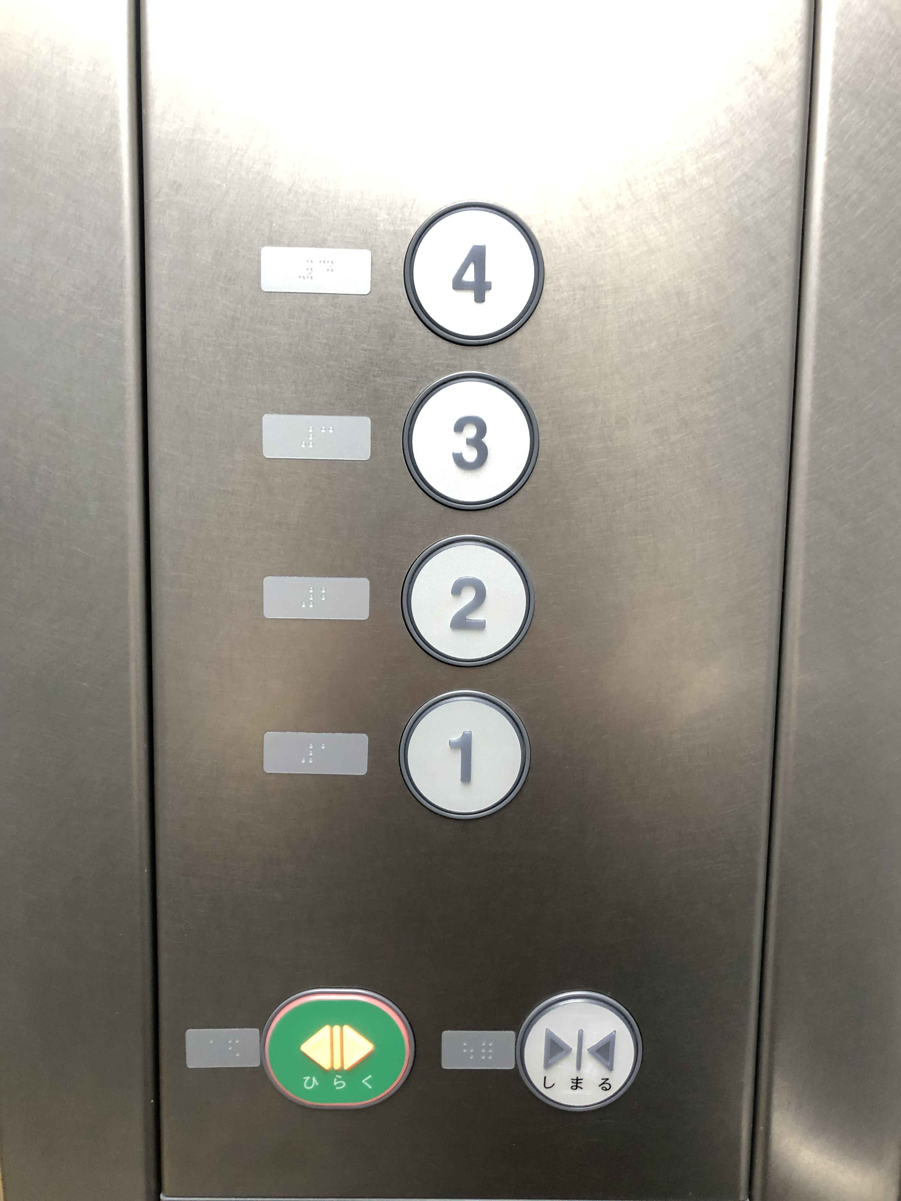 エレベーターのボタン1の画像。
